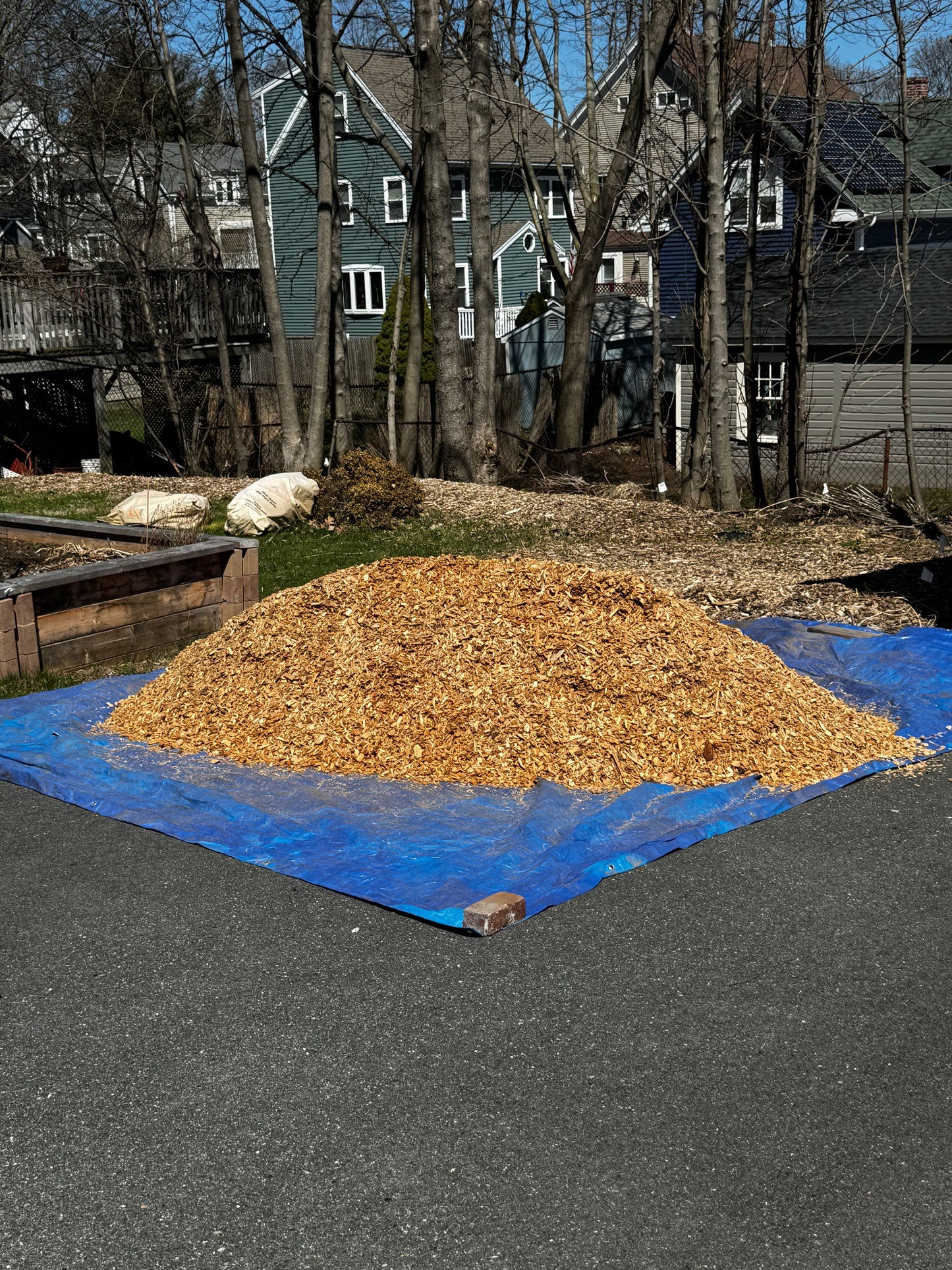 Playground mulch installed at a residential play structure