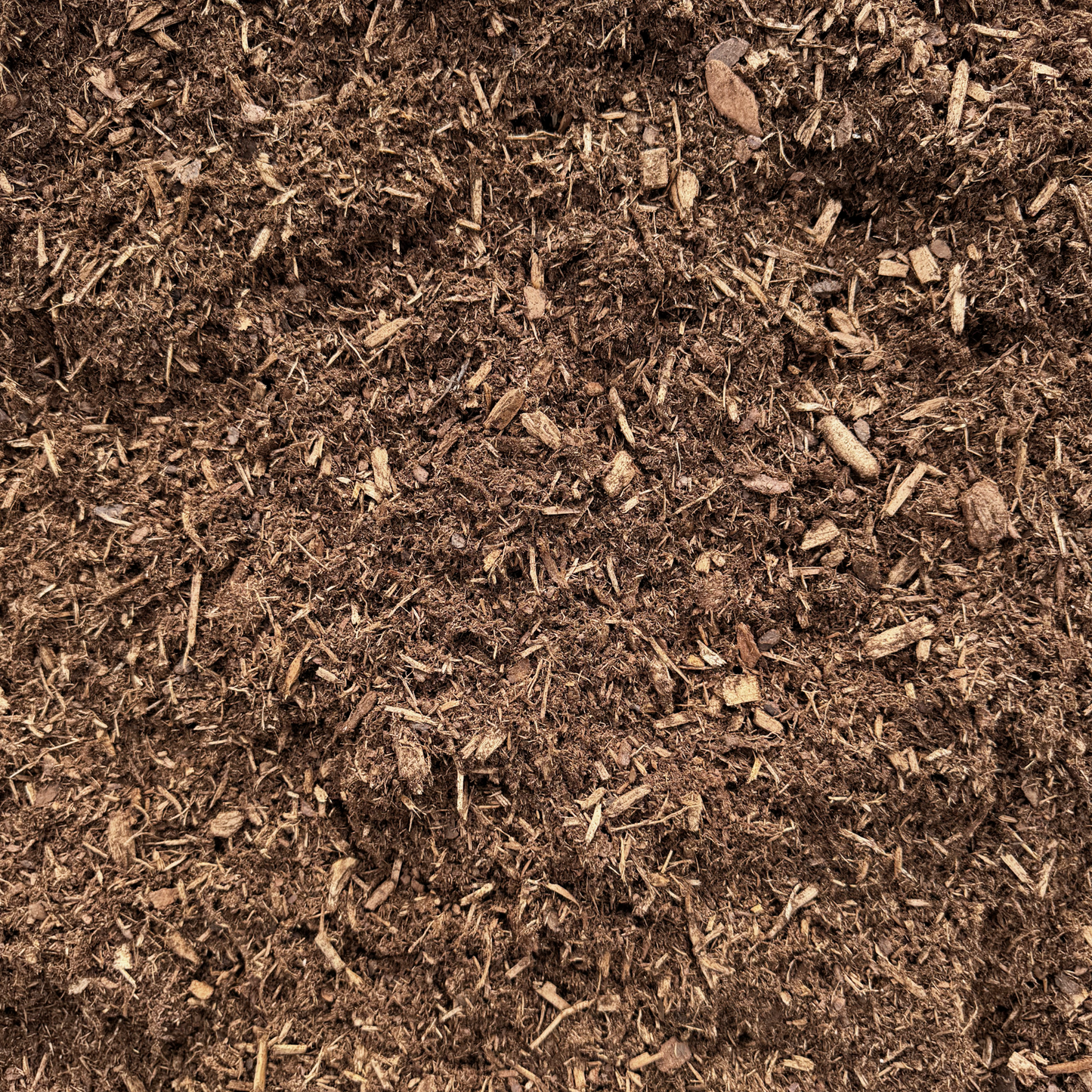 Pine Bark Mulch — chunky natural pine bark for slope-holding garden beds