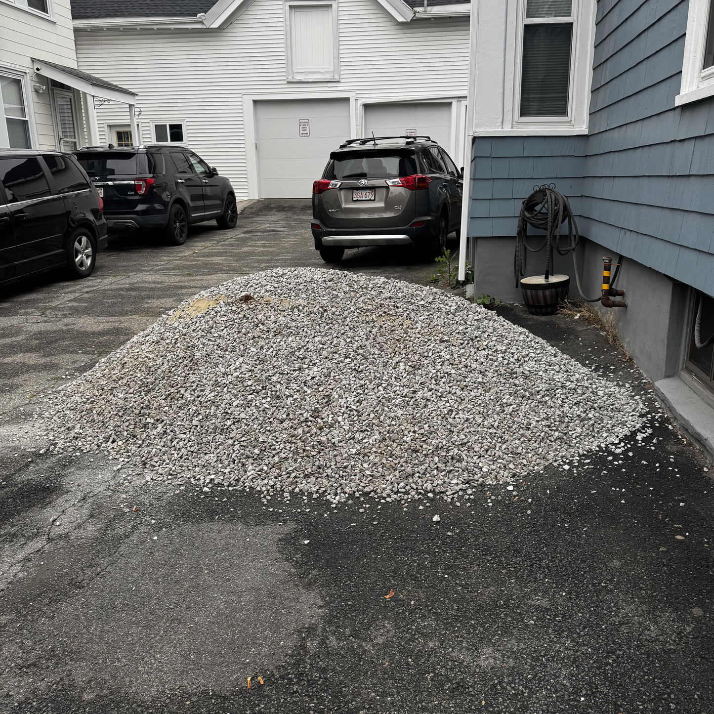 #57 stone in bulk pile — drainage and concrete aggregate ready for delivery
