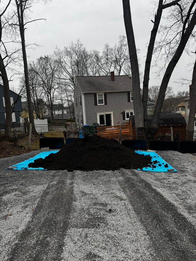 Super loam in dump truck — bulk delivery across Greater Boston