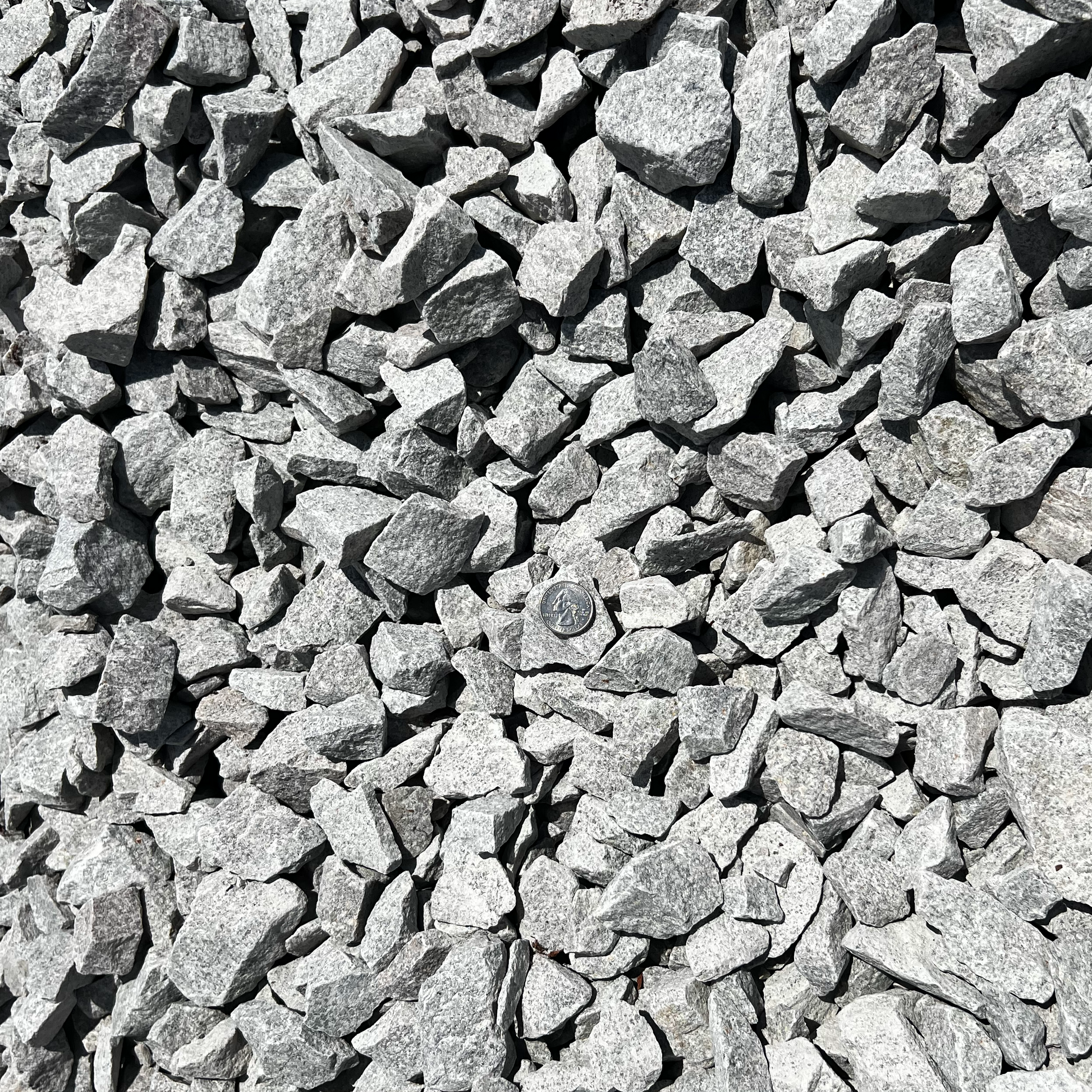 #4 Stone (Crushed Granite Ballast) — AASHTO M43 / ASTM D448 No. 4 heavy drainage stone, 1½-inch top size