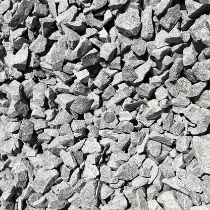#4 Stone (Crushed Granite Ballast) — AASHTO M43 / ASTM D448 No. 4 heavy drainage stone, 1½-inch top size