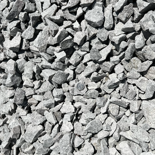 #4 Stone (Crushed Granite Ballast) — AASHTO M43 / ASTM D448 No. 4 heavy drainage stone, 1½-inch top size