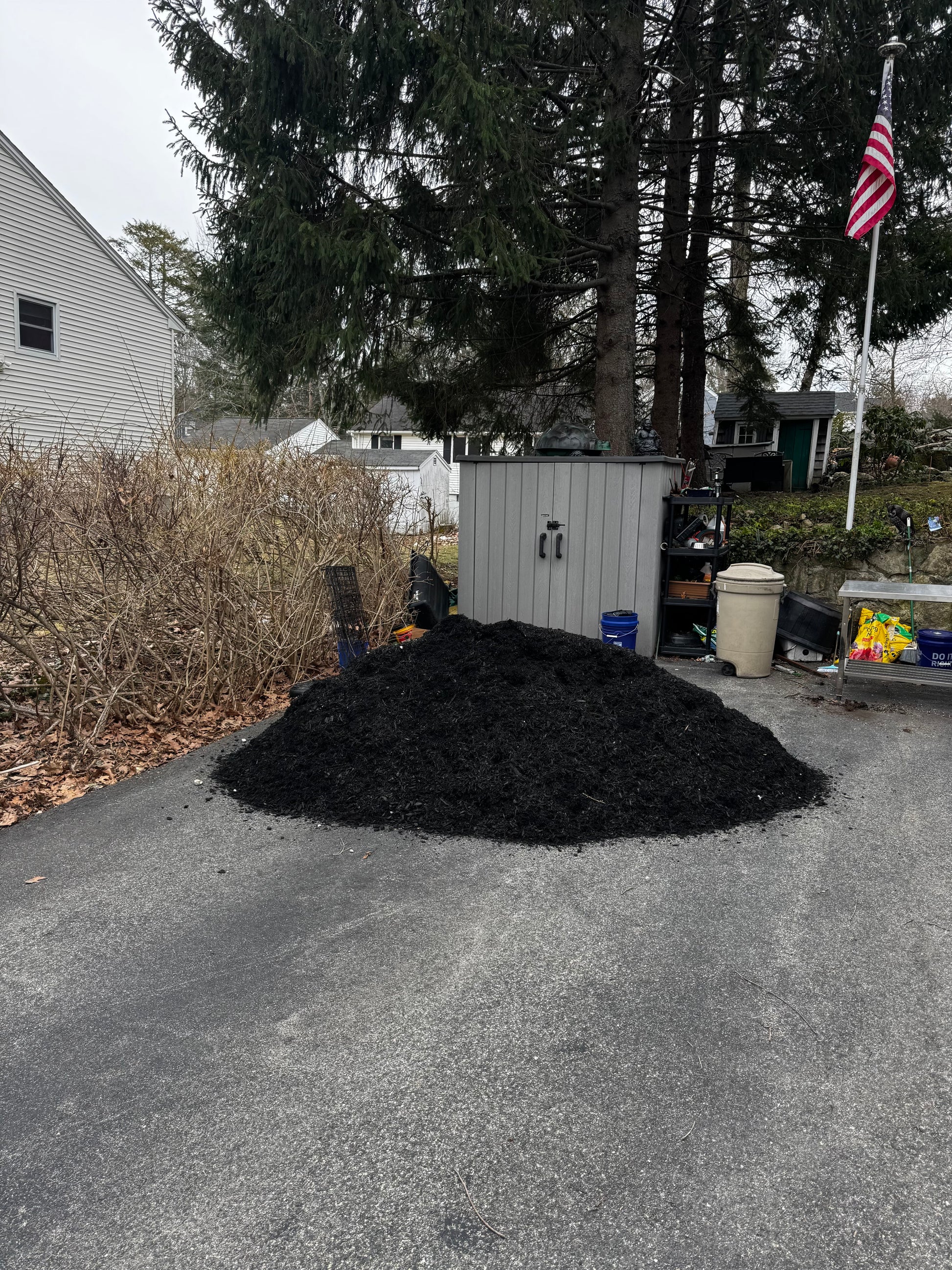 Premium black mulch close-up — color-enhanced dyed mulch