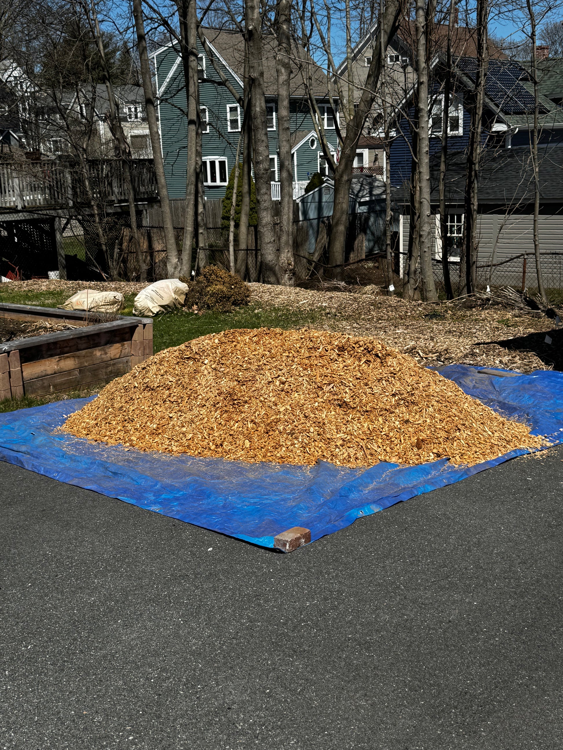 Playground mulch installed at a residential play structure