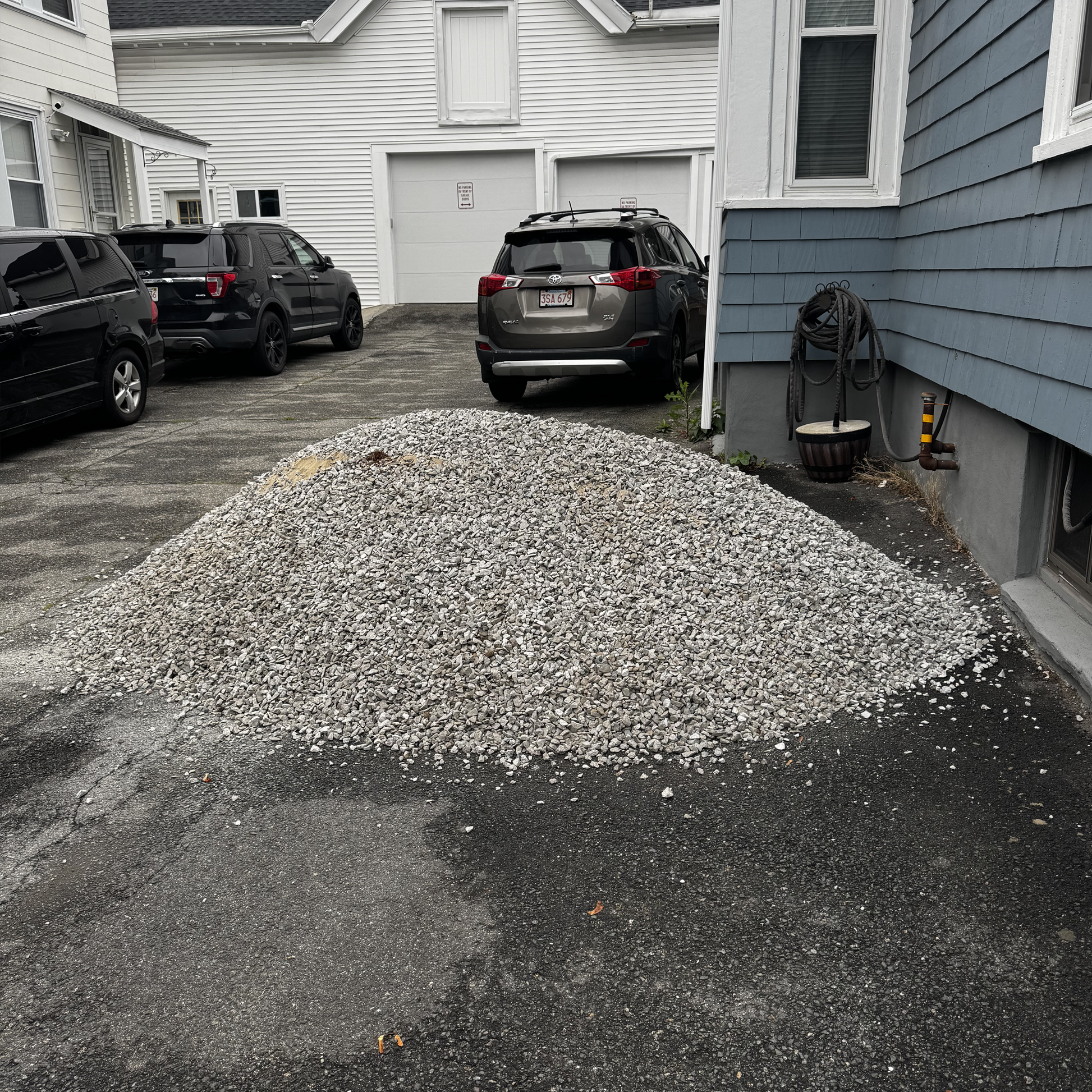 #57 stone in bulk pile — drainage and concrete aggregate ready for delivery