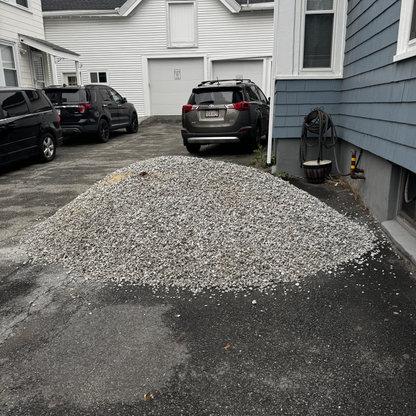 #57 stone in bulk pile — drainage and concrete aggregate ready for delivery