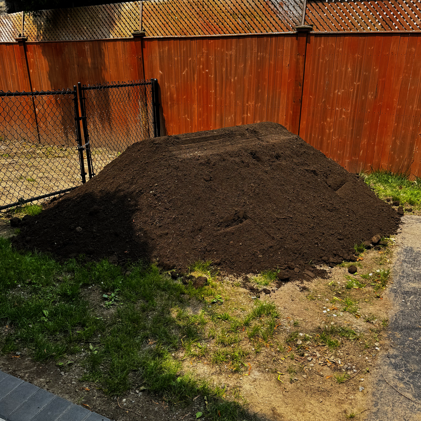 Screened topsoil delivered to a residential property in Greater Boston